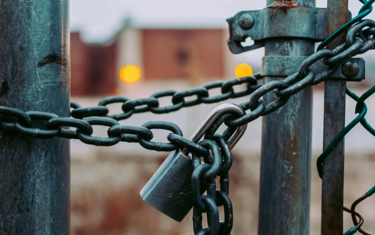 Laminated steel padlock